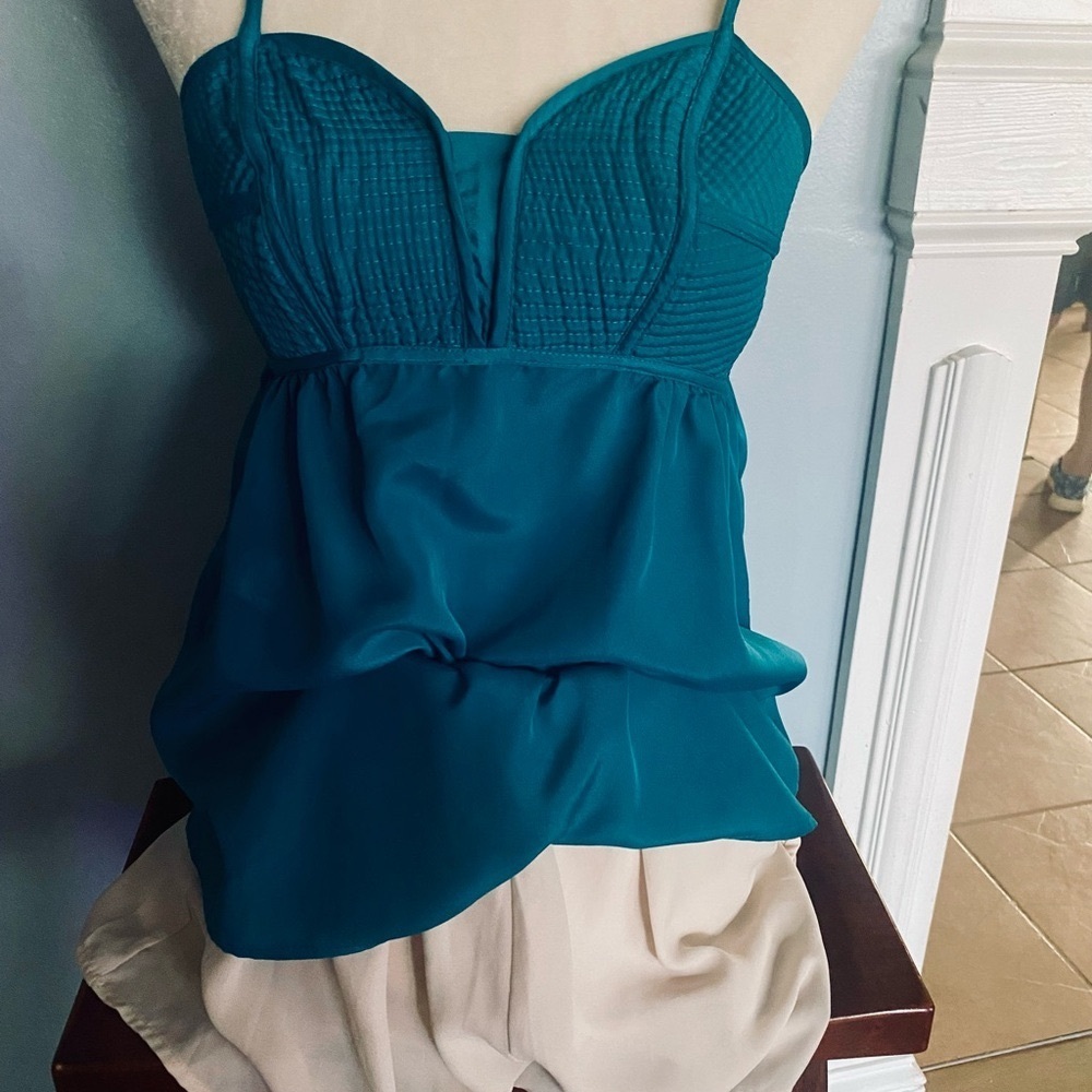 Satiny Teal Spaghetti Strap Top paired with Beige dressy shorts